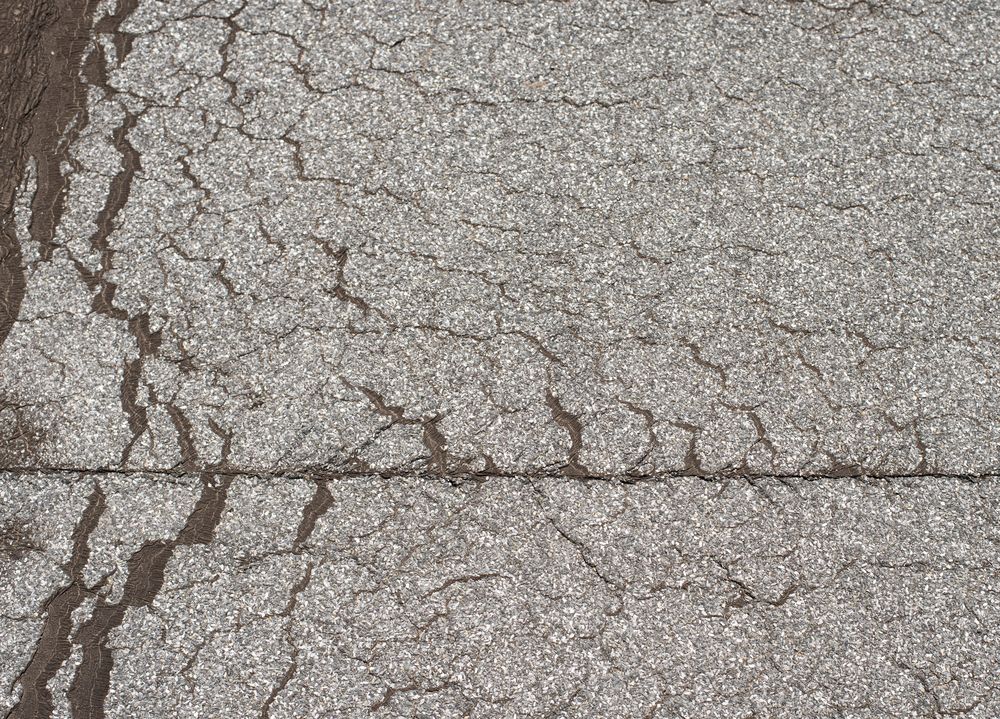 Losliggend dakleer op plat dak in Ospel